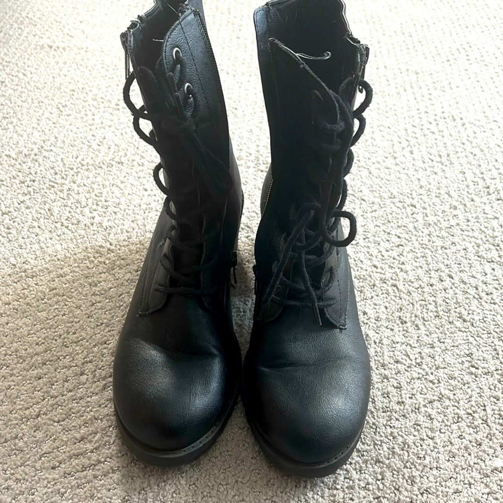 Black tie up boots by Sun and Stone. Size 8